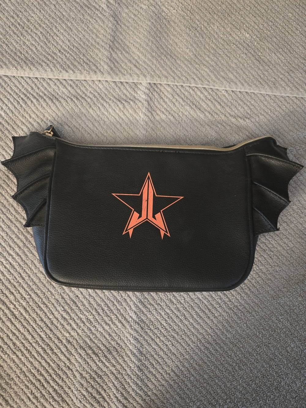 Black Bat Wing Leather Crossbody with Orange Star Logo